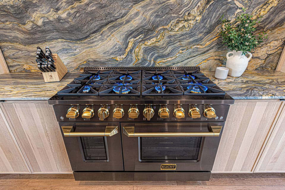 Imagine what you'll cook on our stunning 8-burner stove & double oven!