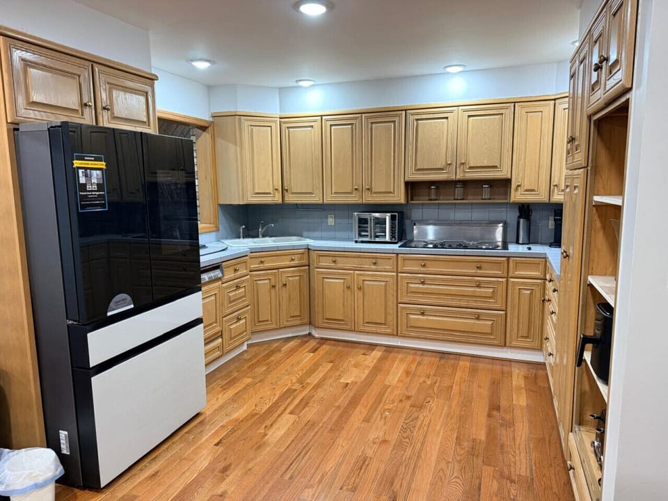Kitchen — Stainless + Quartz