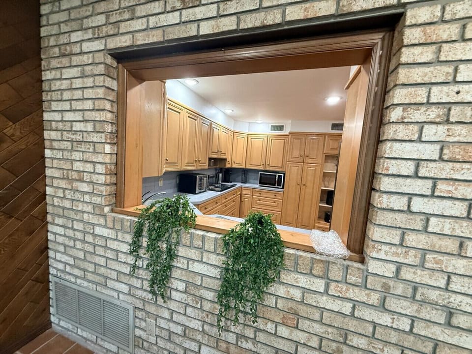 Kitchen — Stainless + Quartz