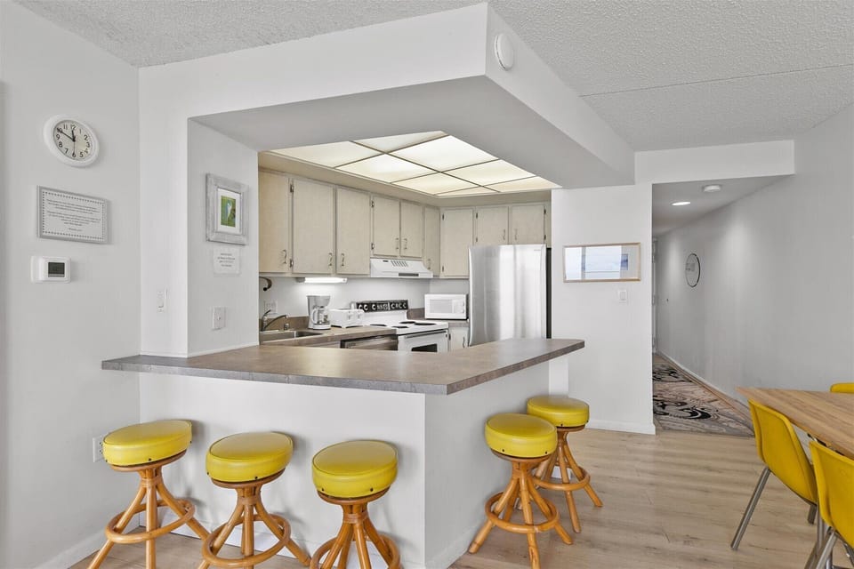 The breakfast bar is the perfect spot for morning coffee!