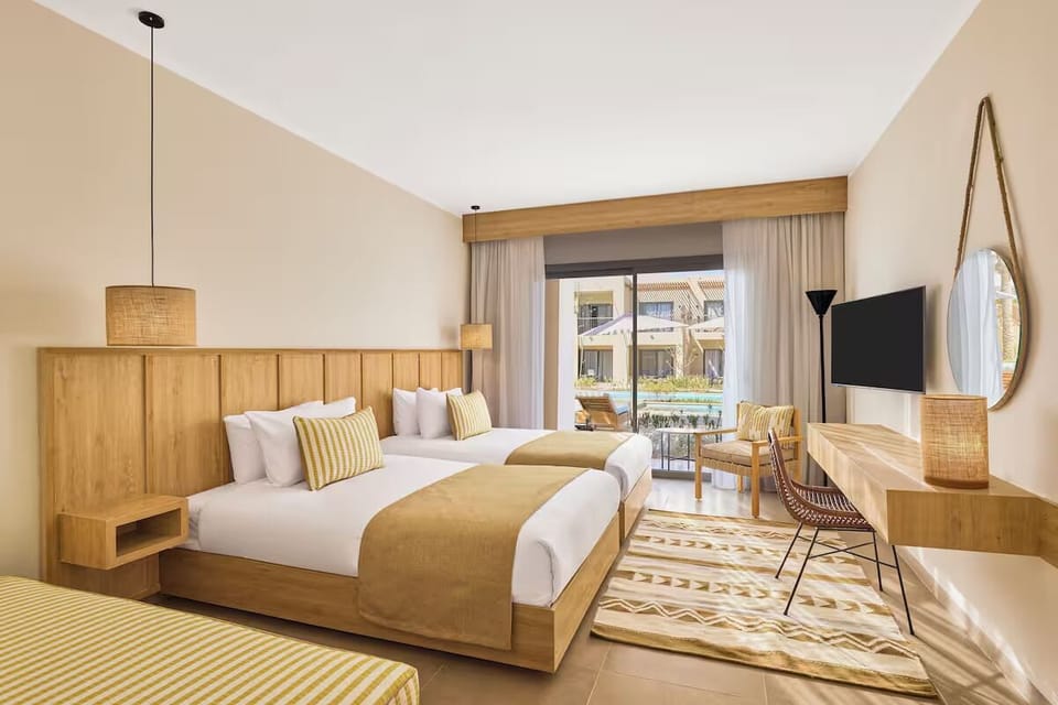 Wake up to poolside scenery from your private terrace seating.