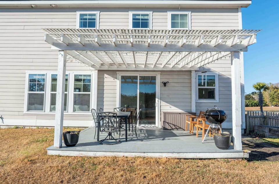 Dine al fresco under the pergola — your backyard escape starts here.