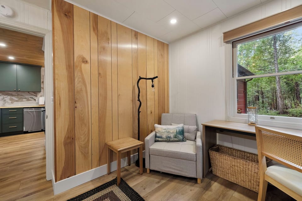 Relax or read in the chair, pull out the lap top and get some work done or even write at the desk. There is a separate area in the master bedroom to utilize some quiet time. The chair can also pull out for a child sleeping spot.