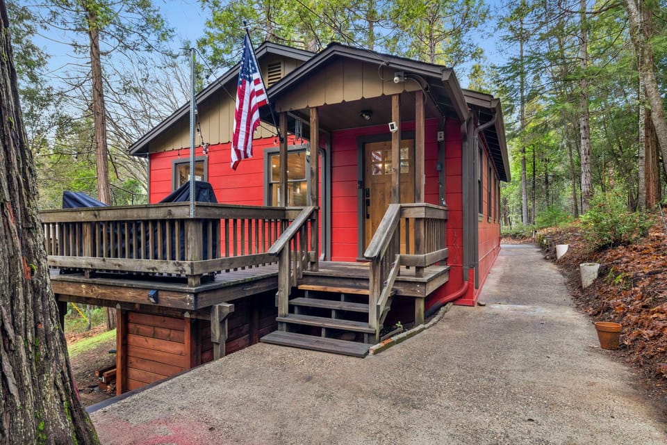 The charming red Lower Cabin.