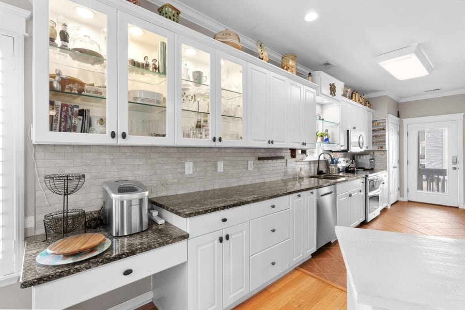 Bright, spacious kitchen with modern farmhouse charm and ample storage
