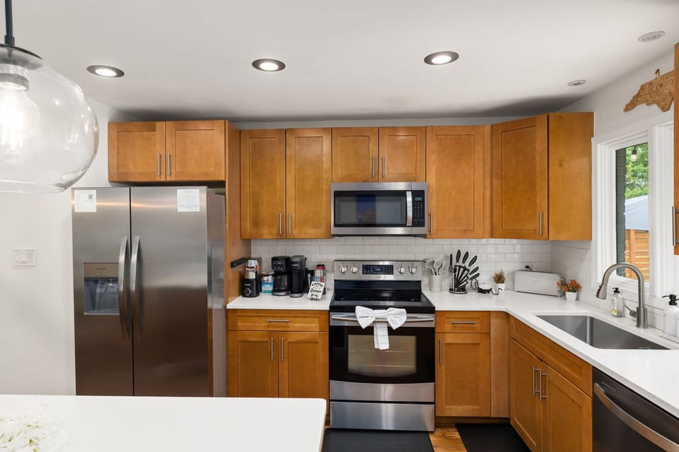 Bright modern kitchen with stainless appliances and ample counter space
