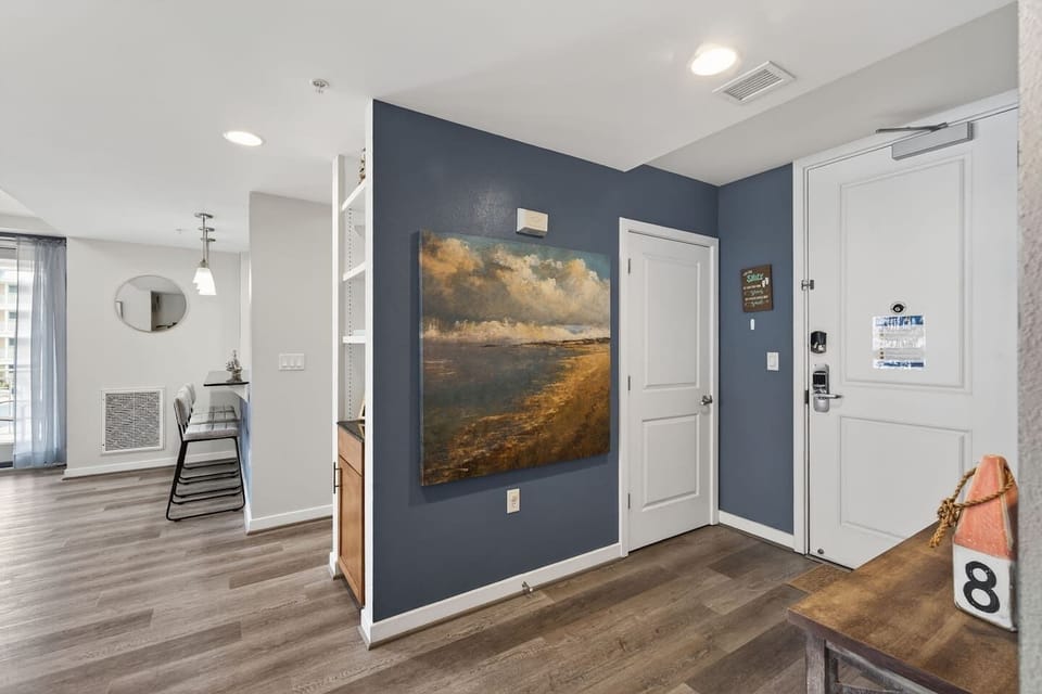 Welcoming entryway with coastal décor and easy access to all main living areas.