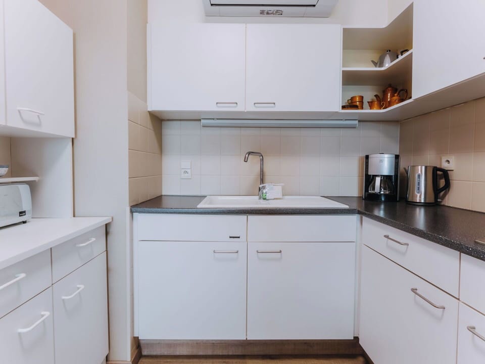 Kitchen, Countertop, Kitchen Appliance, Cabinetry, Major Appliance, Kitchen Sink, Interior Design, Sink, Flooring, Home