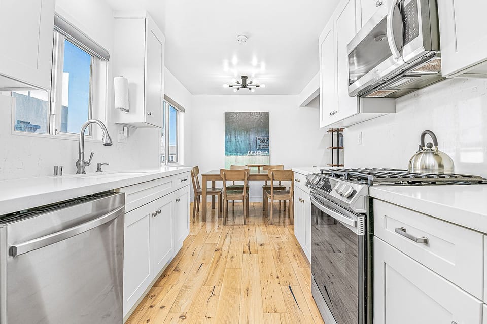 Chef-ready kitchen with generous counter space and full cookware
                