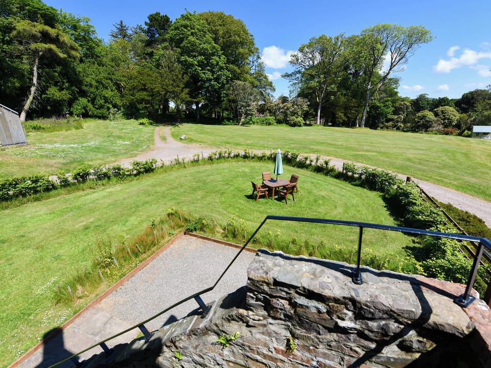 View of garden from entrance | Stables Cottage - Corsewall Estate Holiday Cottages, Kirkcolm, near Stranraer