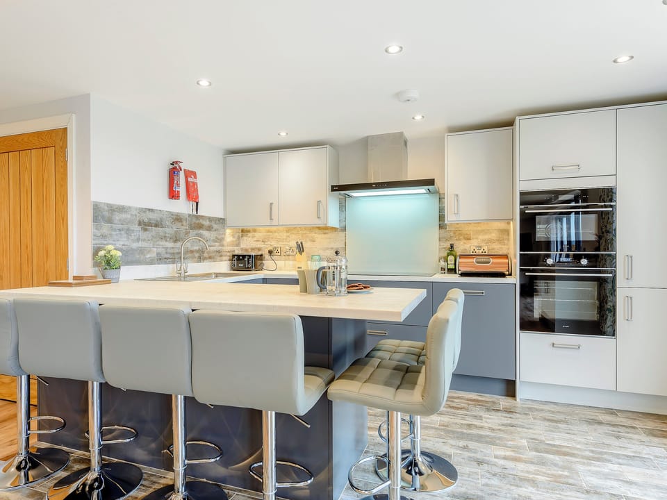 Modern kitchen area | Fairchild&rsquo;s Barn - Fairchilds, Caldecott, near Uppingham