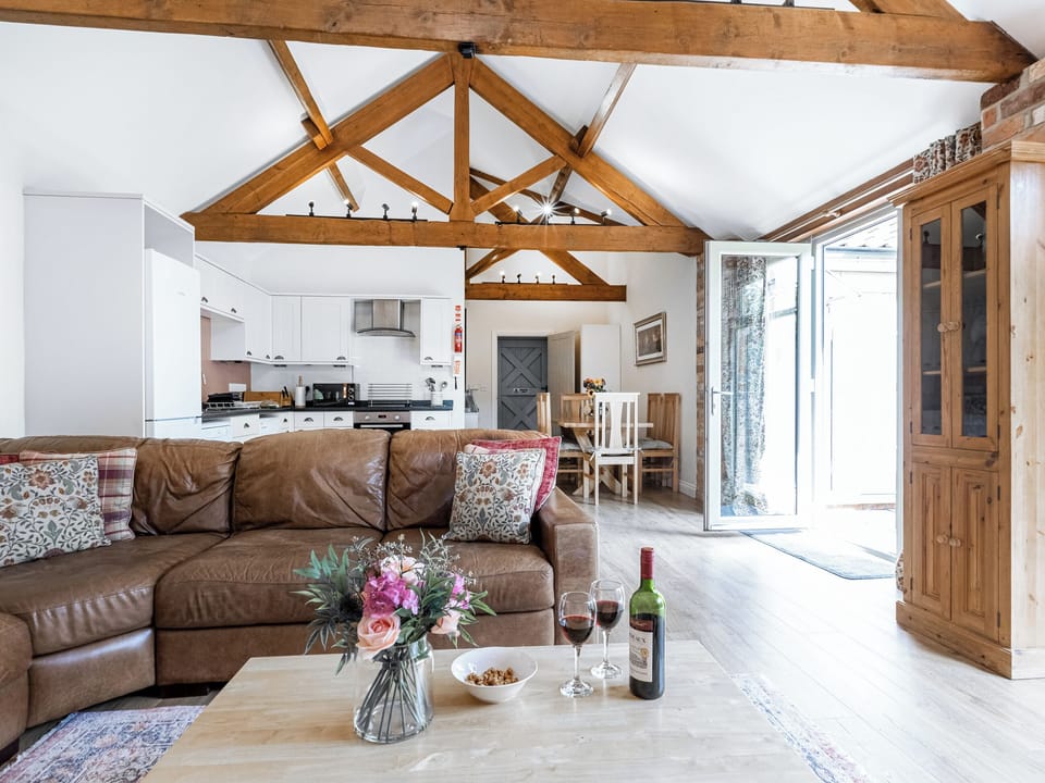 Living area with access to the patio | Willow Cottage, Harwood Dale, near Scarborough