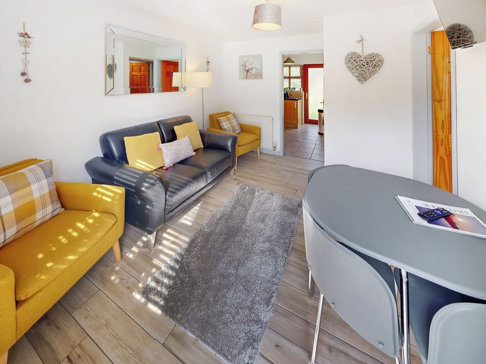 Living room/dining room | Elm Cottage - Graiglwyd Springs Holiday Cottages, Penmaenmawr, near Conwy