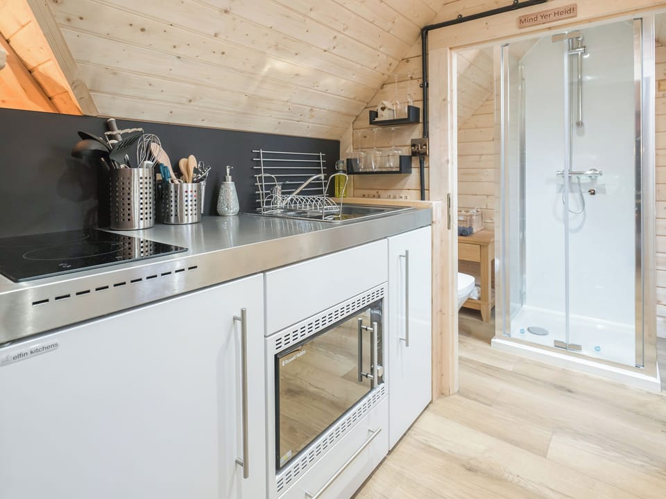 Kitchen area | Copper Beech Cabin - Punch Tree Cabins, Carluke