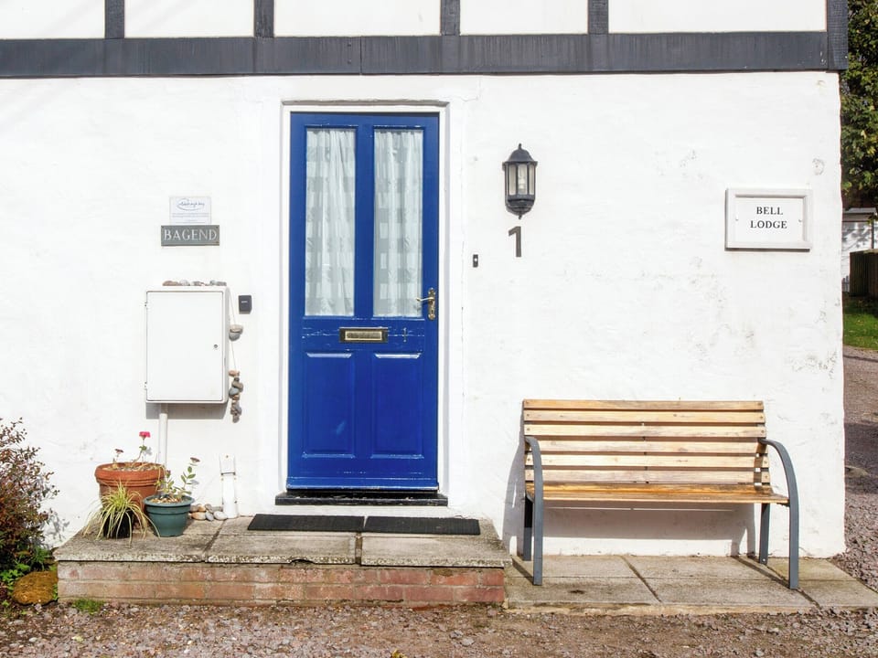 Small patio with outdoor furniture | 1 Bell Lodge, Thorpeness, near Aldeburgh