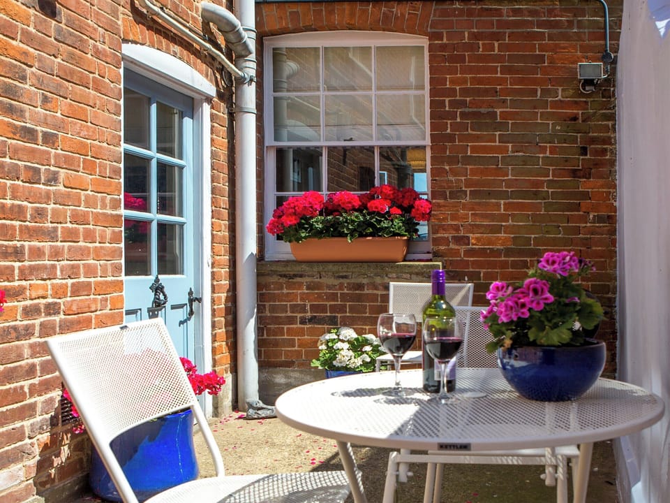 Rear courtyard with outdoor furniture | Market Cross Place, Aldeburgh