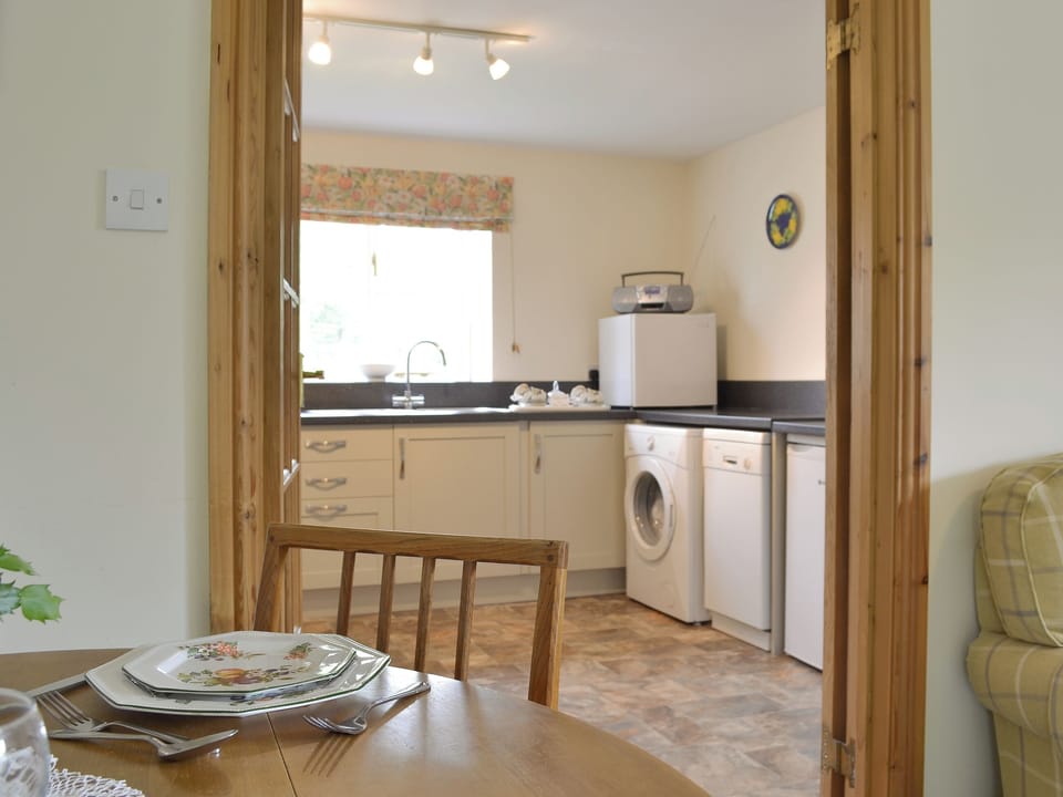 Living/ dining room leading throught to the kitchen | The Arches - Home Farm Holiday Cottages, Slingsby, near Malton