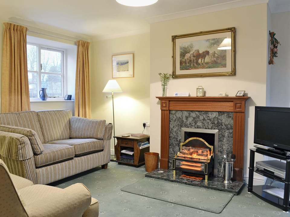Homely living/dining room | The Arches - Home Farm Holiday Cottages, Slingsby, near Malton