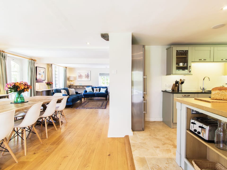 Beautiful dining area with wooden fllor | The Dairy House, Illminster