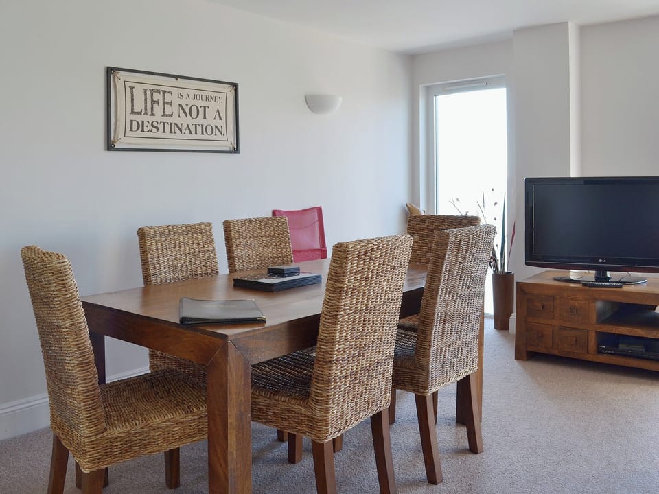 The large dining table comfortably seats six people | Apartment 6 - Astor House, Torquay