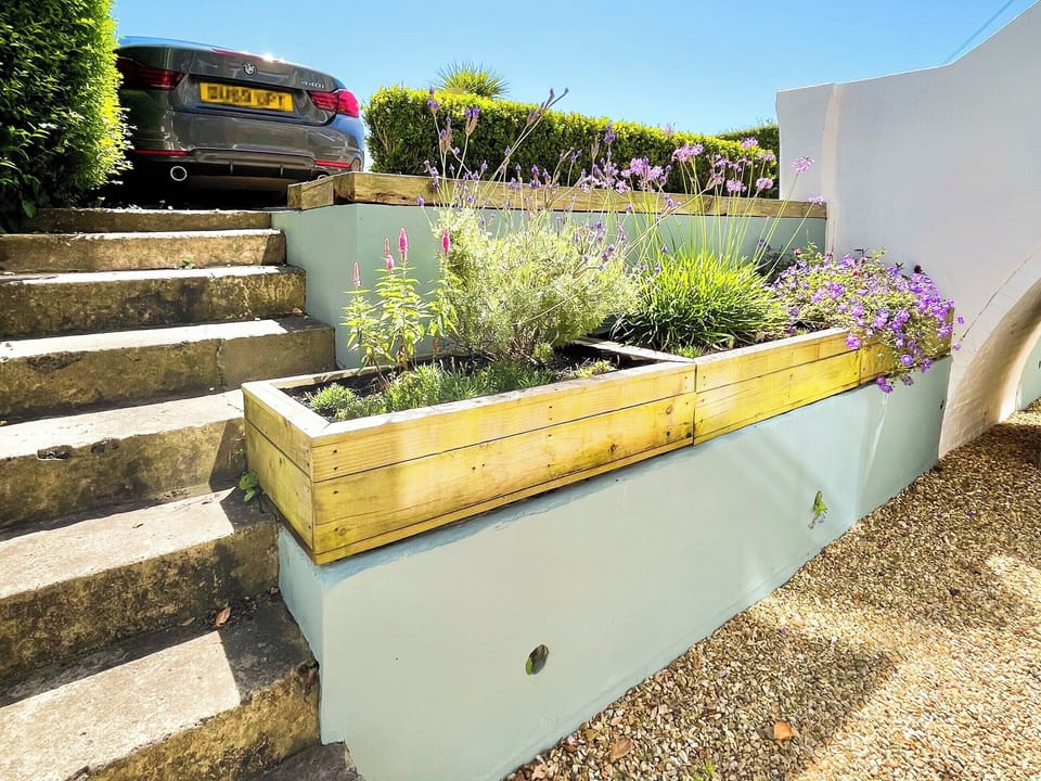 Enclosed decked area with garden furniture | Little Grosvenor, Ventnor