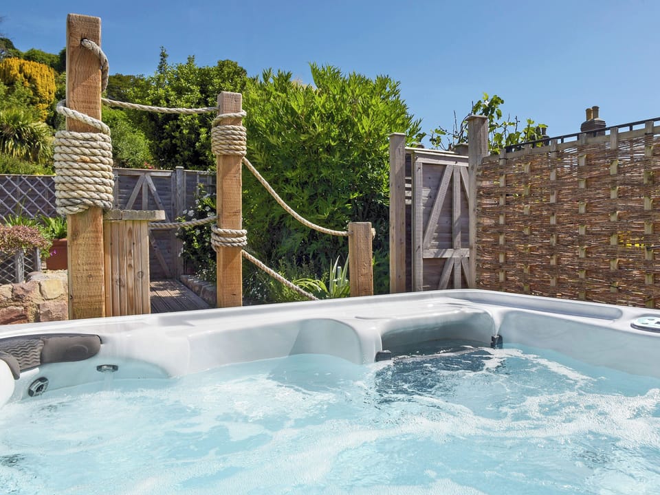 Hot tub | Stone Barn - Vicarage Road Holiday Cottages, Minehead