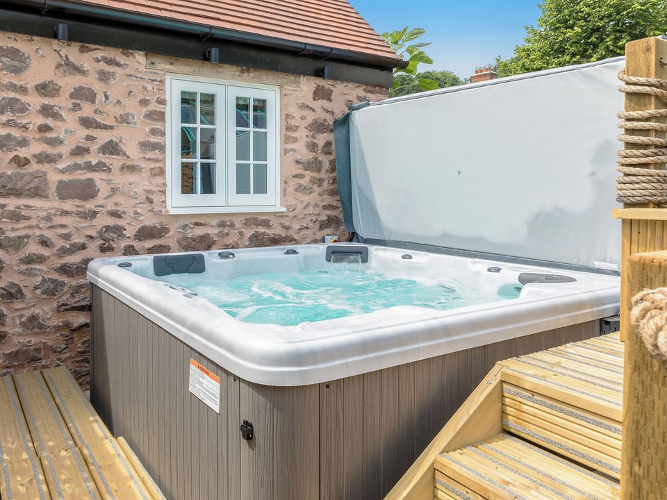 Fantastic hot tub | Stone Barn - Vicarage Road Holiday Cottages, Minehead