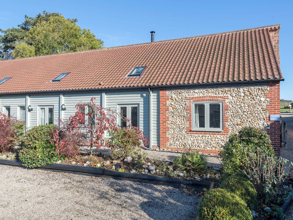 Traditional brick and flint Norfolk farm building | The Henhouse - Manor Mews, Tattersett, near Fakenham
