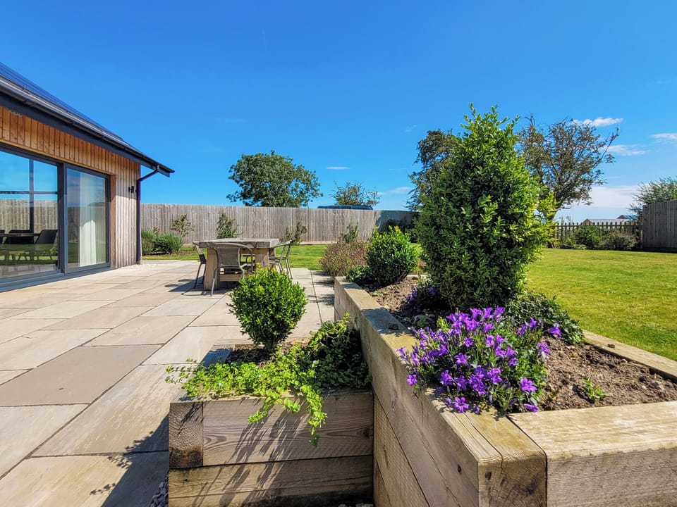 Outdoor area | Blue Iris Cottage - Ashlin Farm Barns, Dunholme, near Lincoln