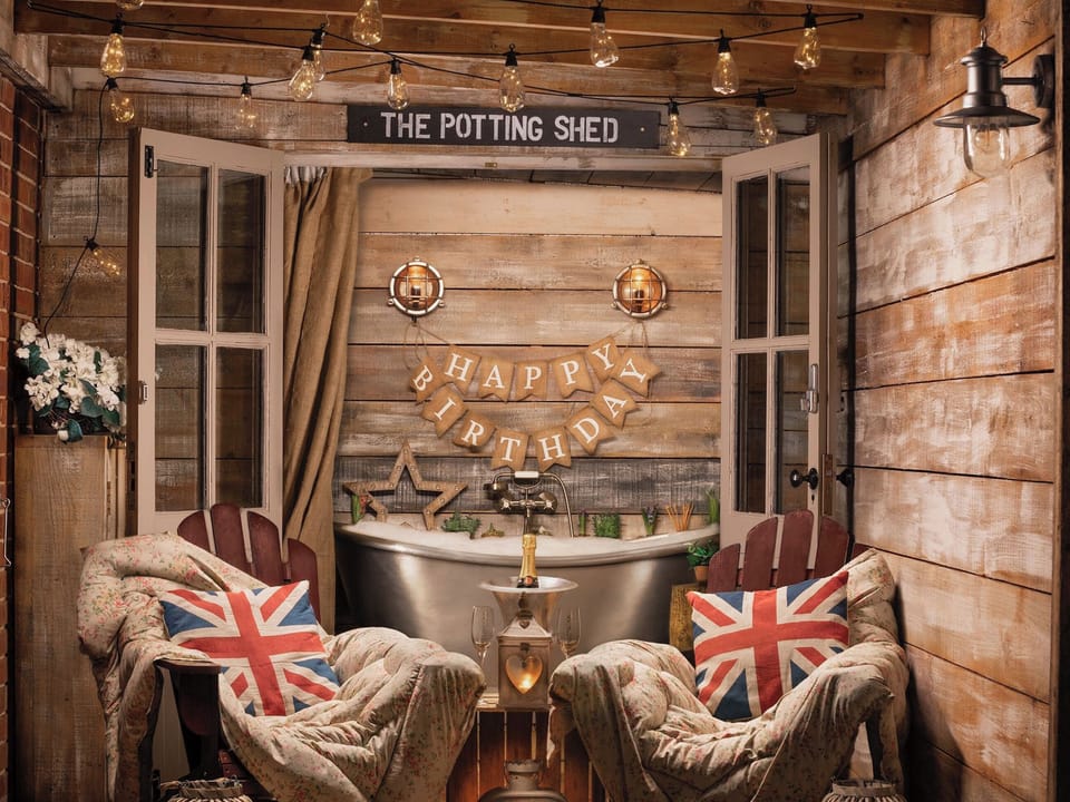 Unique roll top bath in the heated outdoor bathroom known as The Potting Shed. | The Old Parlour - Cheshire Boutique Barns, Wrenbury, near Nantwich