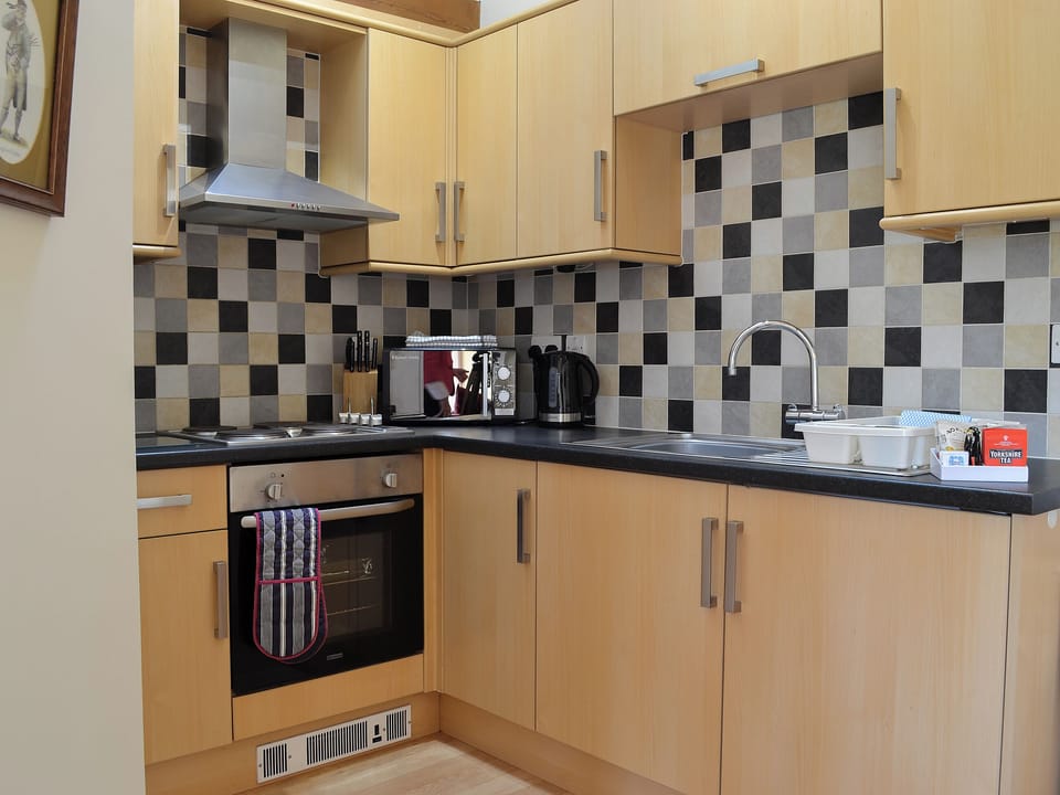 Modest kitchen area | Stables Cottage - Mackinder Farms, Brayton, Selby