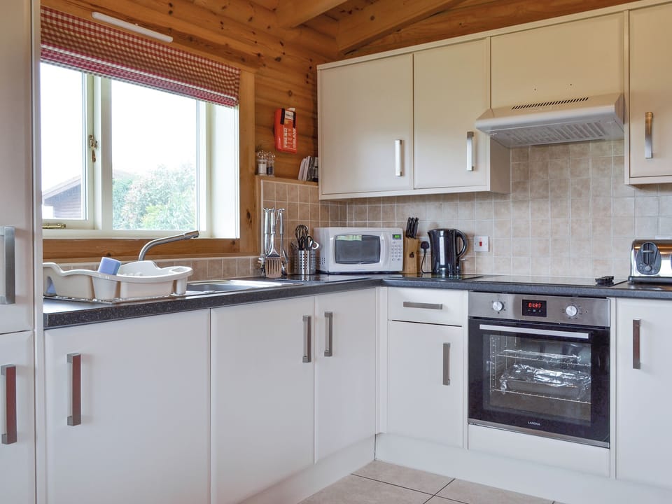 Well-equipped kitchen | Kingfisher Lodge - Mackinder Farms, Brayton, Selby