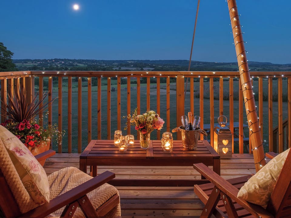 Sitting-out-area | Lower Keats Glamping, Tytherleigh, near Axminster