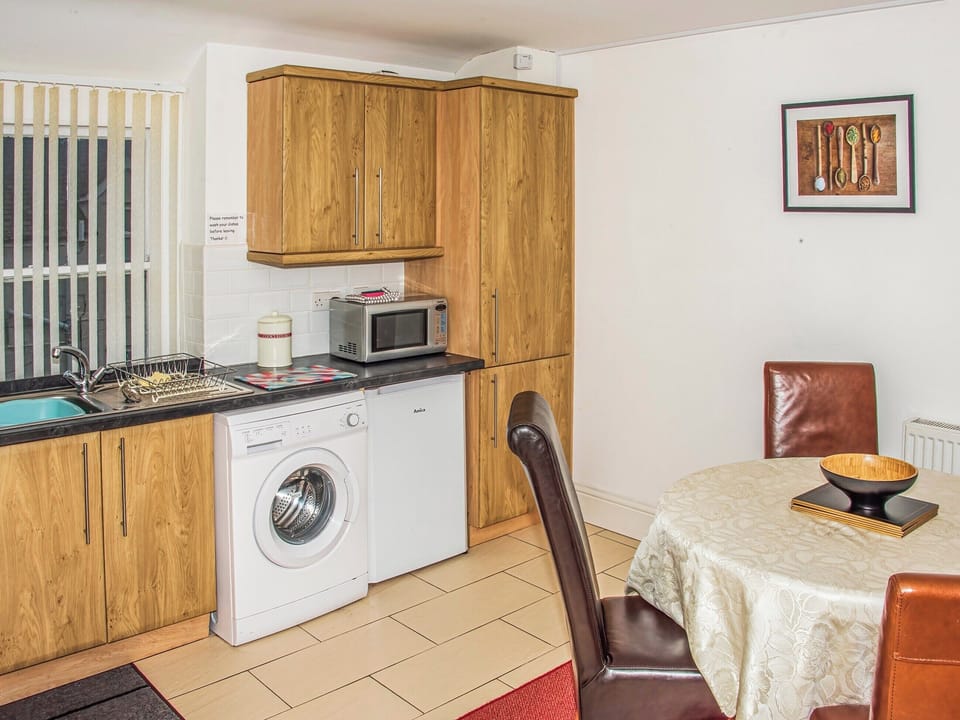 Kitchen/diner | Apartment 5 - Cosy Llandudno Apartments, Llandudno