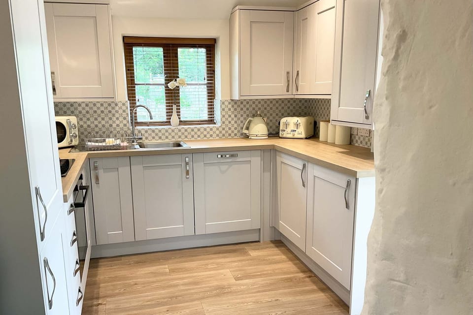Kitchen area | Towan Cottage - Carnebo Holiday Barns, Perranporth