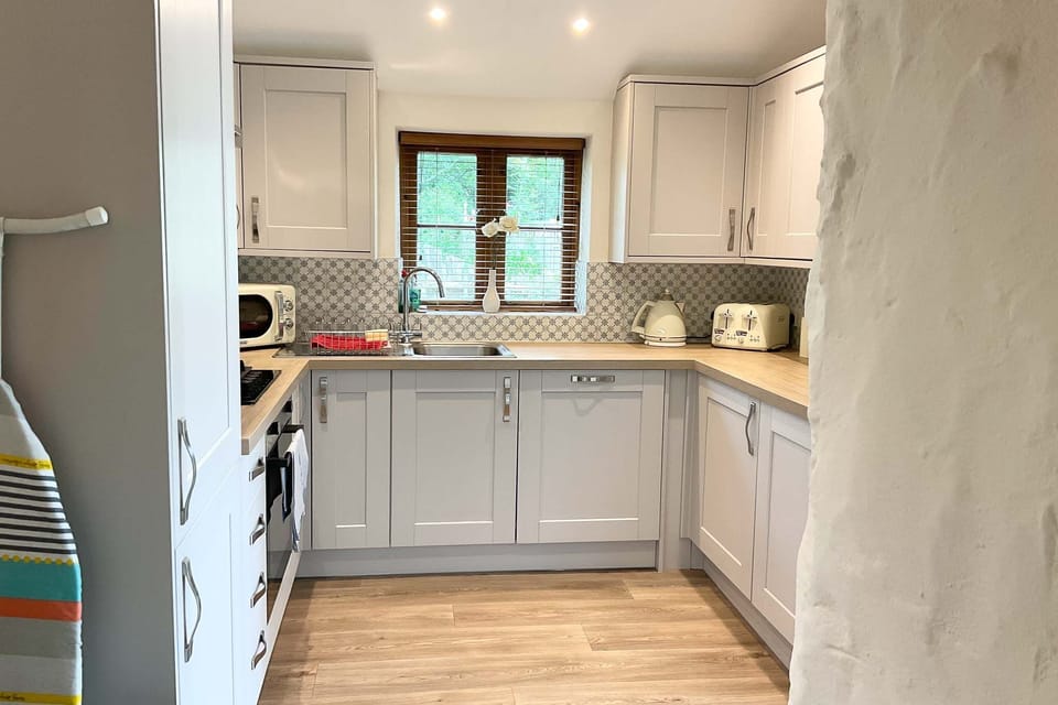 Kitchen area | Towan Cottage - Carnebo Holiday Barns, Perranporth
