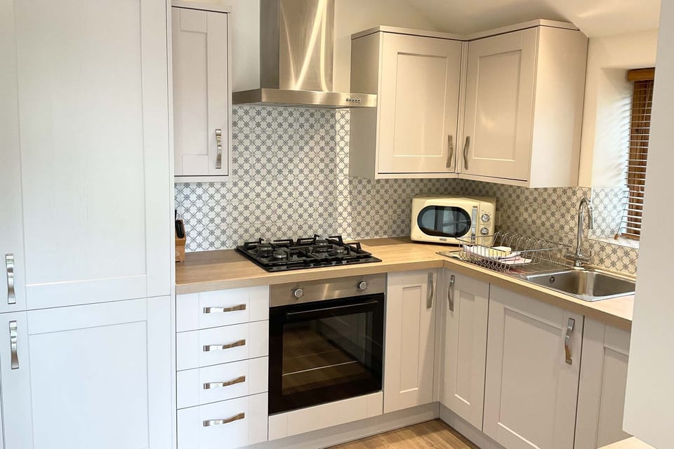 Kitchen area | Towan Cottage - Carnebo Holiday Barns, Perranporth