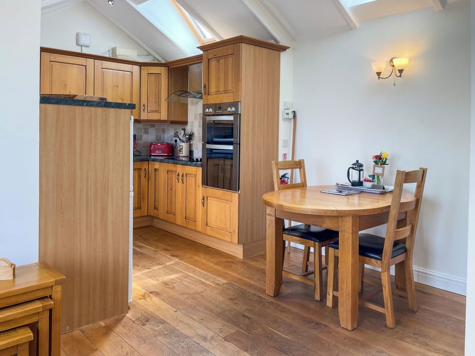 Open plan living space | Pen-y-Bryn - Canllefaes Cottages, Penparc