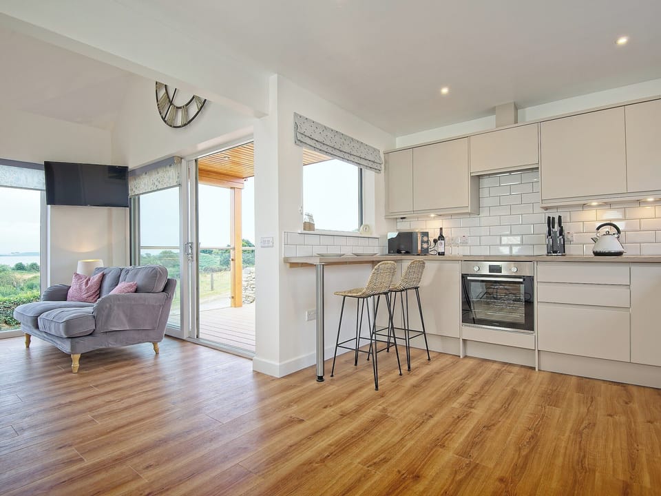 Wonderfully equipped kitchen area | Curlew Cottage, Mossyard, near Gatehouse of Fleet
