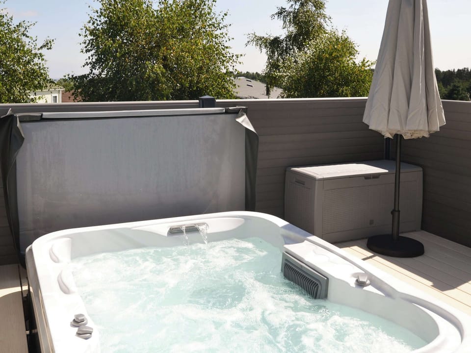 Hot tub | Herdwick Lodge - Percy Woods Golf and Country Retreat, Swarland, near Morpeth
