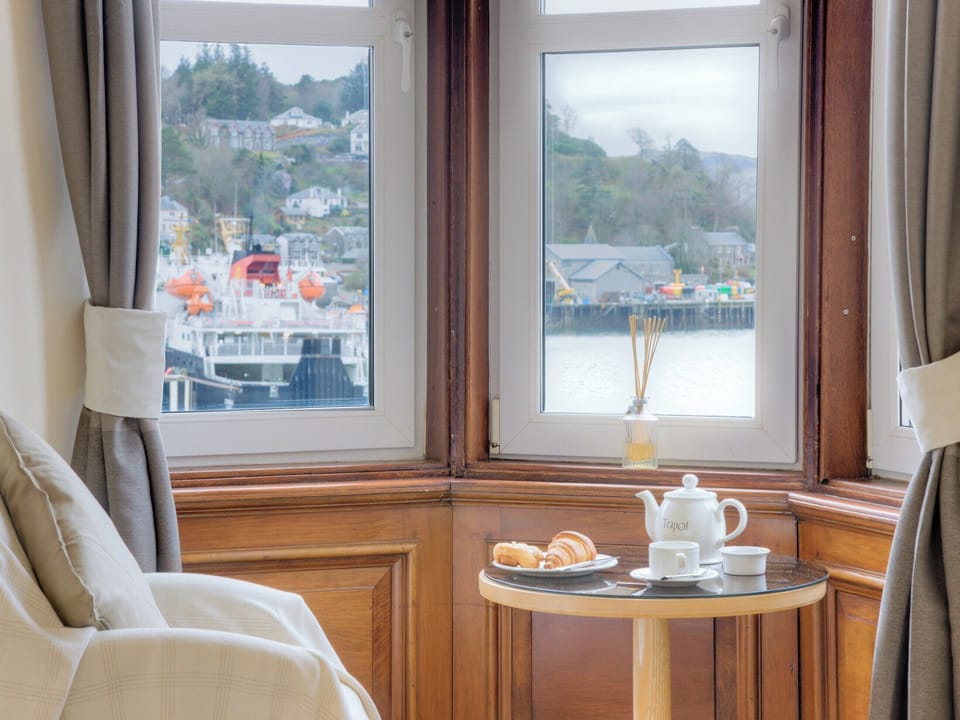 Enjoys stunning panoramic views over Oban Bay from the bedroom | Argyll Mansions, Oban