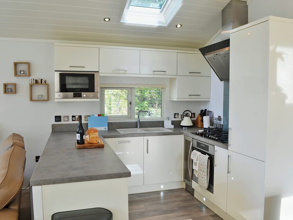 Tastefully modernised kitchen | Ysgubor FadogEin Yfory, Brynteg, near Benllech