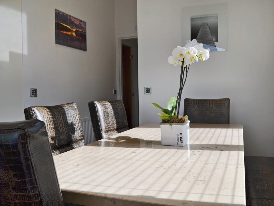 Inviting dining area | Ysgubor FadogEin Yfory, Brynteg, near Benllech