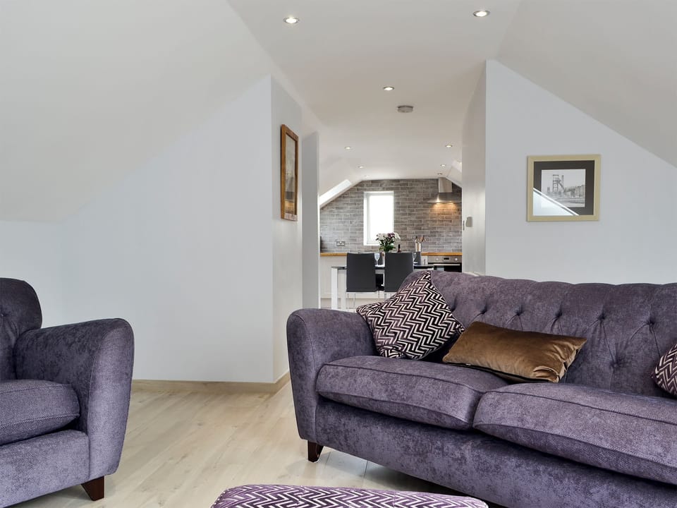 Cosy living room with wood floor | Ty Gambo, Plas Cilybebyll, near Pontardawe