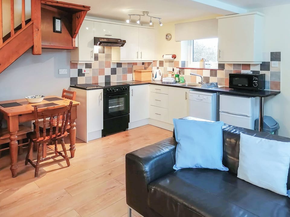 Well-equipped fitted kitchen area of open-plan living space | Millstone - Cotterill Farm, Biggin by Hartington, near Buxton