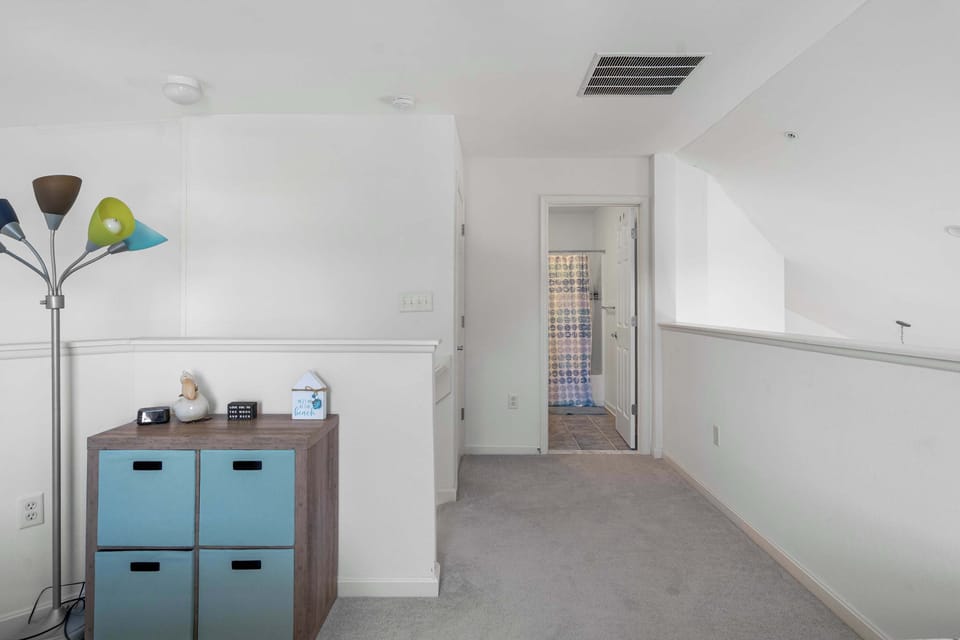 Two cozy twin-sized beds await in the loft​