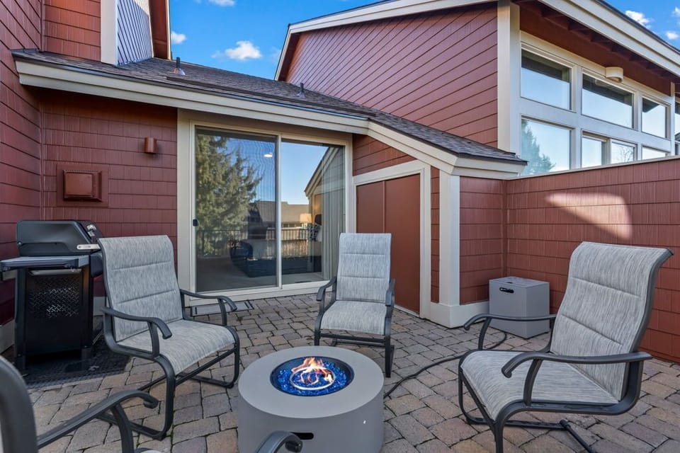 Gather around your private fire pit for memorable evenings, with BBQ facilities and comfortable seating making this patio perfect for relaxation.