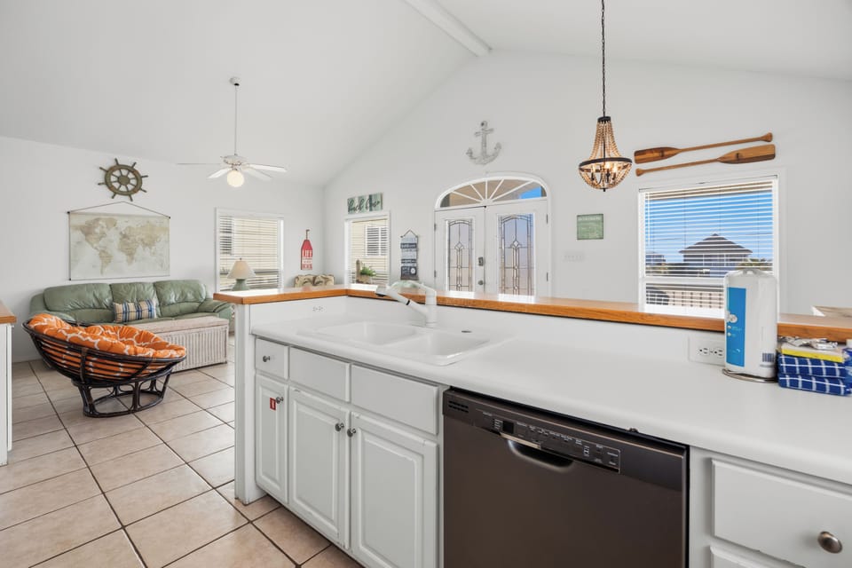 Ample prep space and seating make the kitchen both functional an - Ample prep space and seating make the kitchen both functional and social