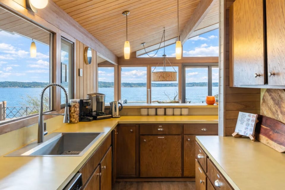 Narrow kitchen layout with fully stocked amenities