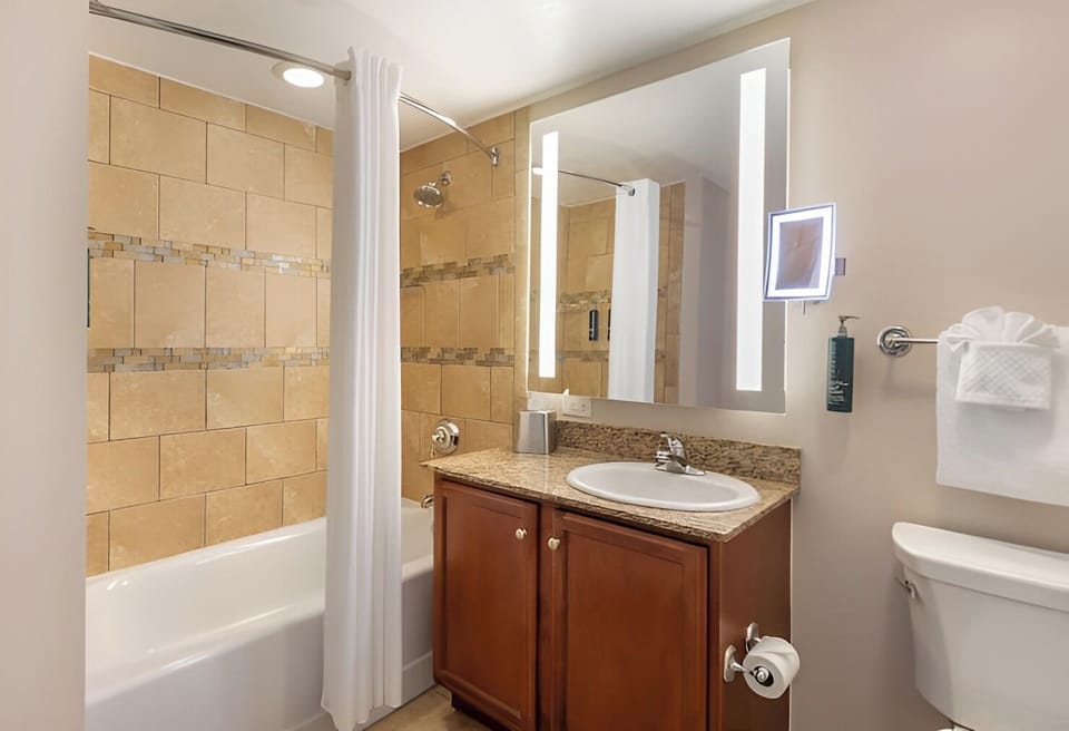 Refresh after the beach with a bright tub-shower combo.